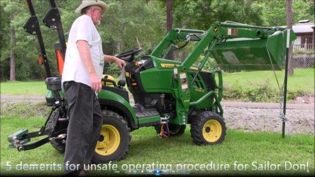 driving wood fence posts with front end loader